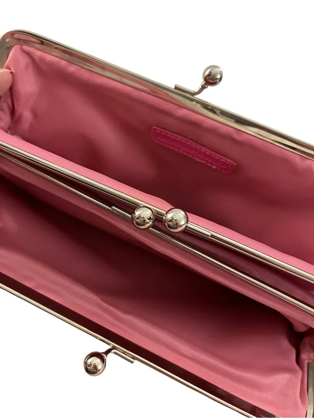 Christopher & Banks clutch features a vibrant multi-color chevron pattern.
